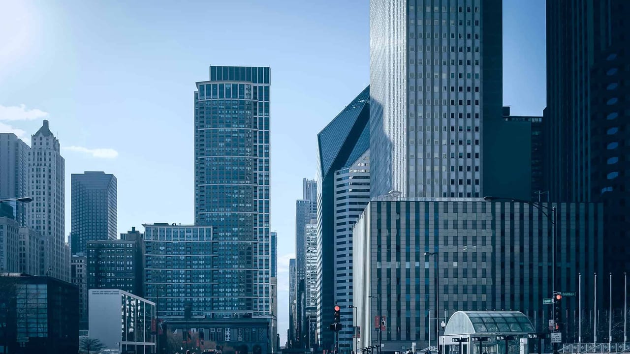 A downtown Chicago street on a clear morning, looking toward the Loop